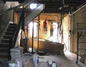 Second floor demolition with the original stair case configuration