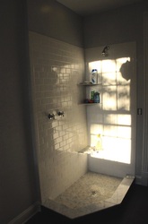 Show stall with marble and subway tiles