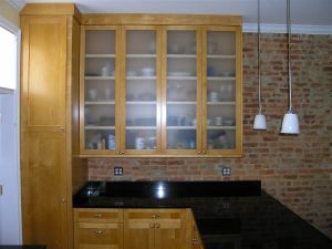 Custom cherry cabinets with frosted glass