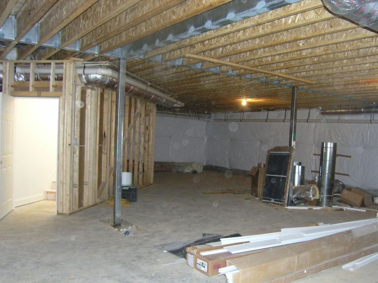Use of hybrid beams to allow larger clear spans