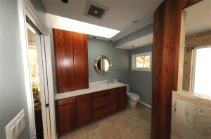 Small space design using Lyptus wood to add warmth to the design