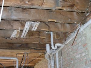 Floor joists damaged by contractors