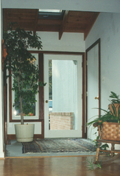 Custom trim in stairwell foyer addition