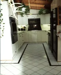 Custom kitchen with tile floor and cherry accents